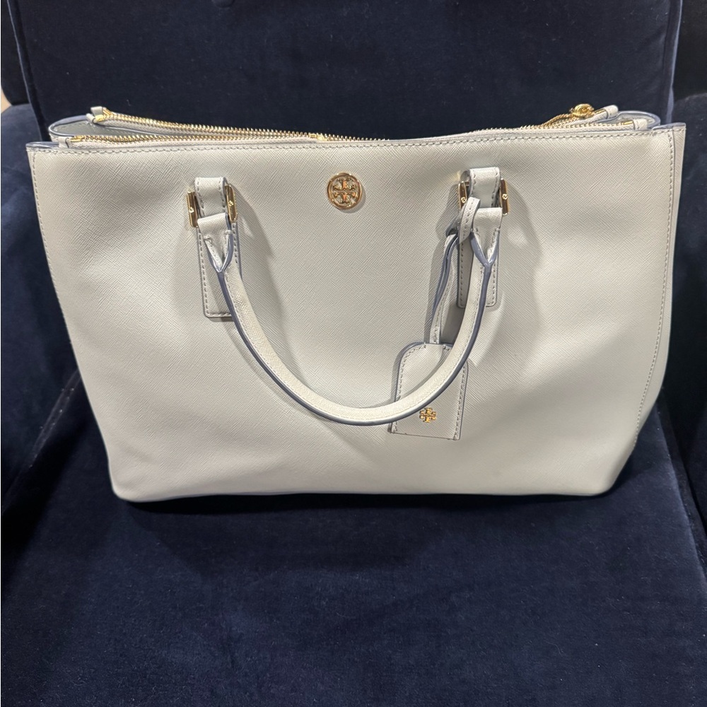 Tory Burch pale blue handbag with gold accents